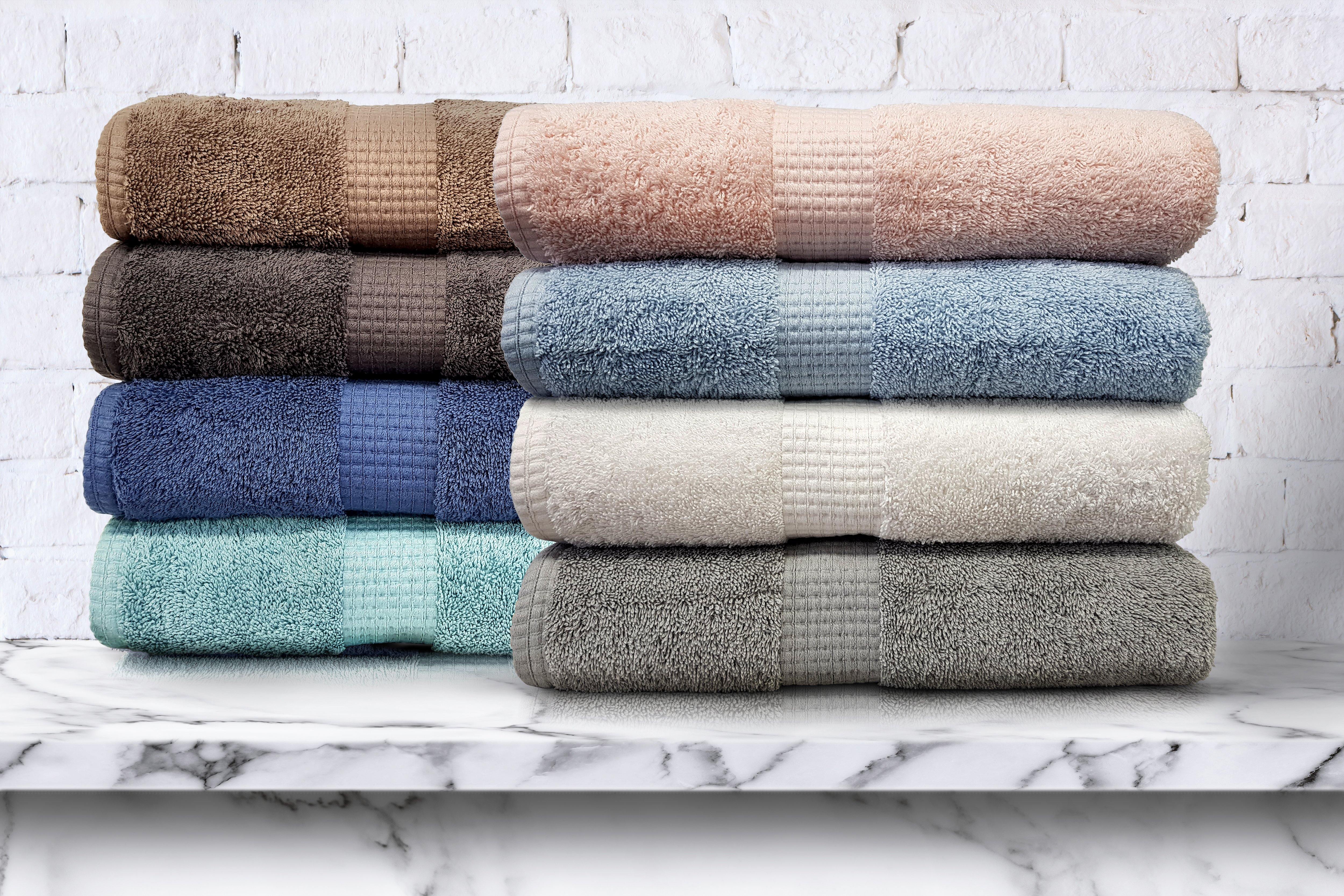 a close up of a stack of suitcases on display