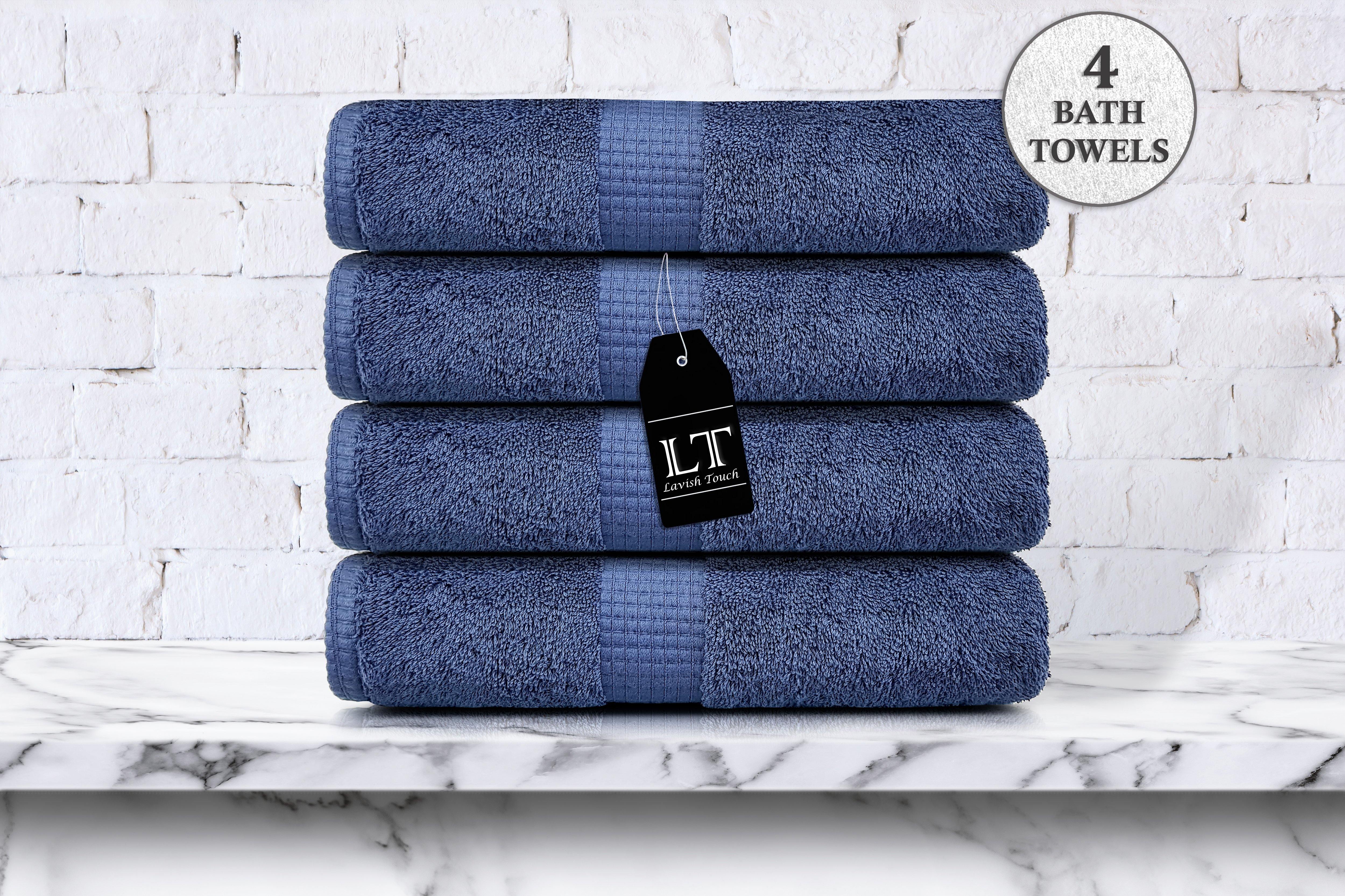 a blue suitcase is sitting on a bench